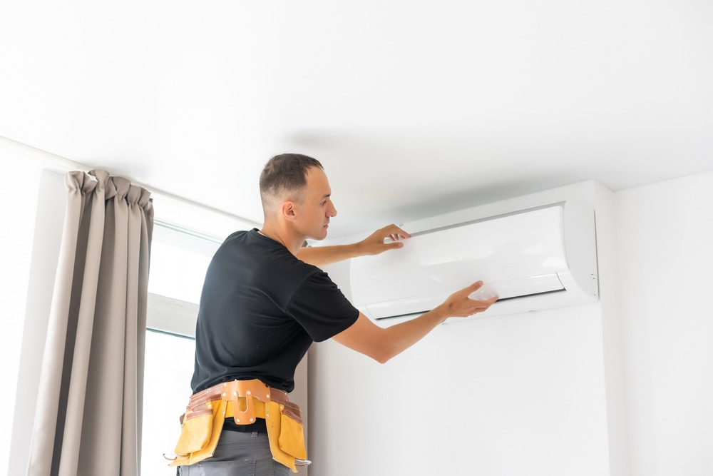 Technician from air conditioning company in Columbus, IN