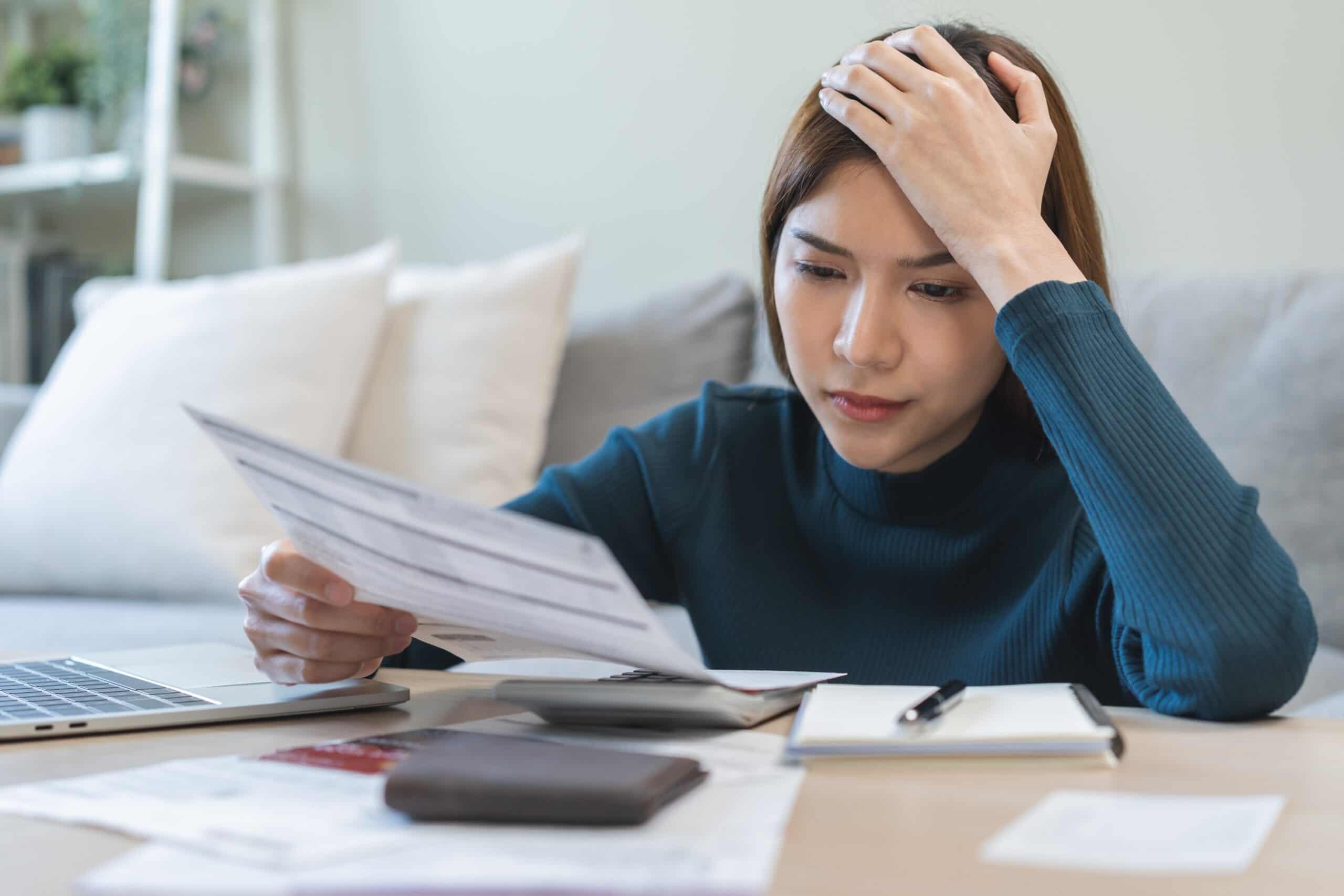 Woman reviewing energy bills